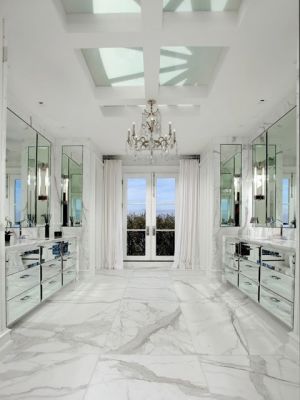 master bathroom marble floor  bath mirrored cabinets vanity vanities crystal chandelier french doors.jpg